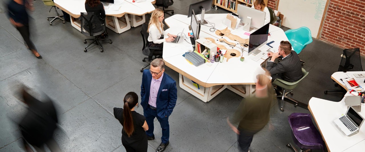 two people working in an agency office